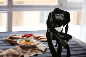 Photo of food on screen of professional camera in studio