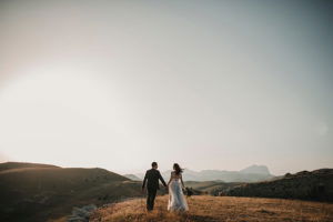 drone-wedding-photography-couple-holding-hands-outdoors