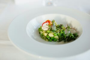 A white bowl with food shot with a lens for food photography