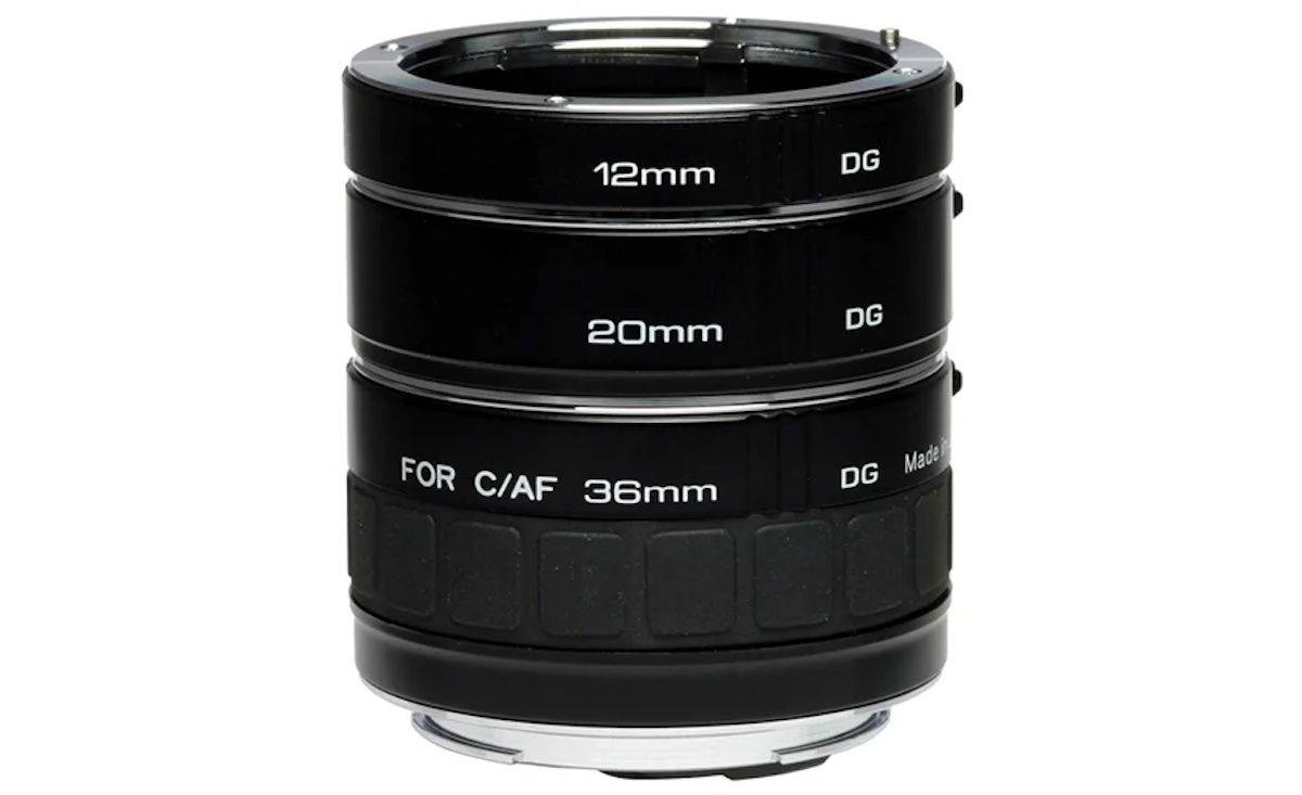 A set of black professional camera lenses, displayed on a white background. 