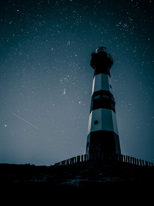 The lighthouse in Bresken (the Netherland) against the winter sky. 