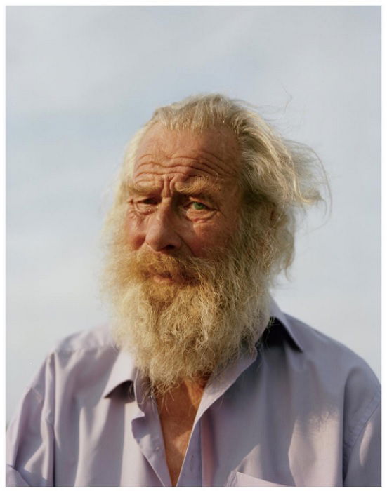 Portrait of bearded man in a collared shirt